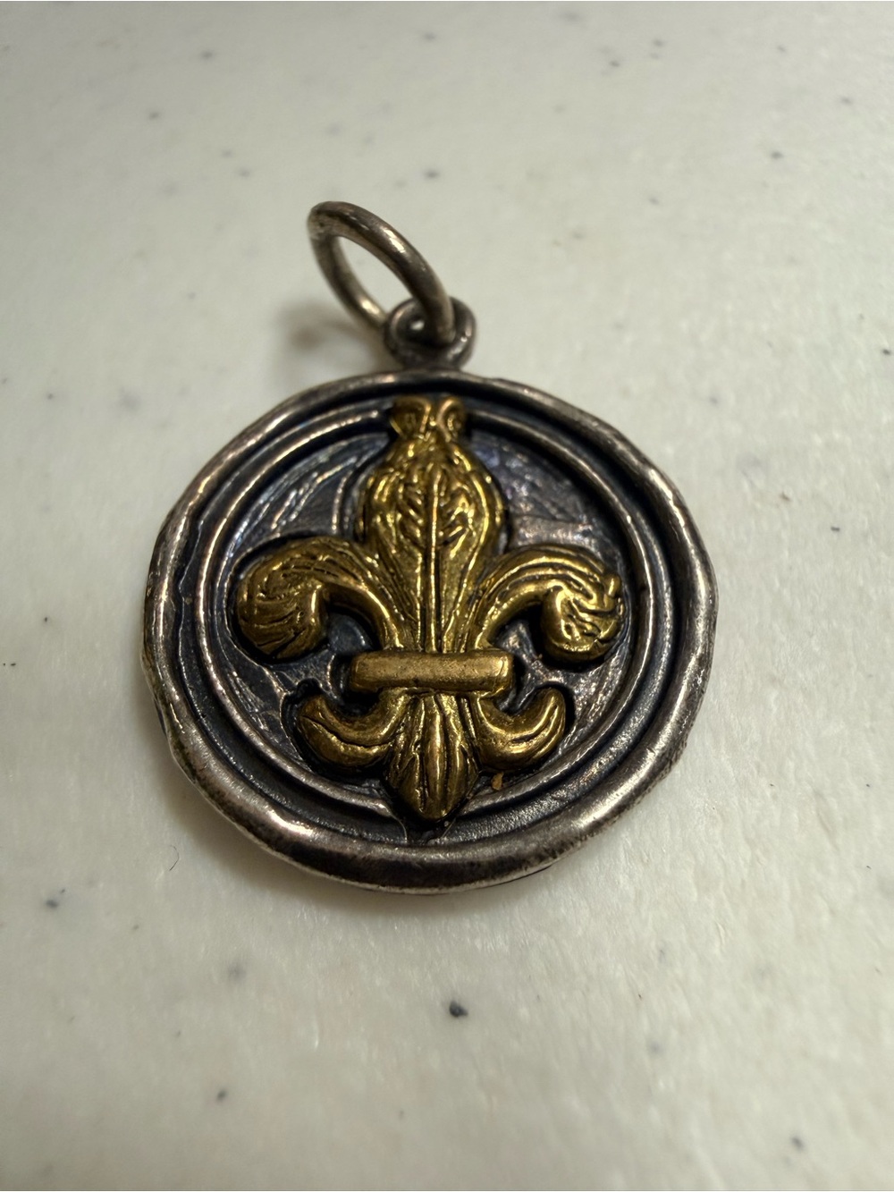 Waxing Poetic Two-Tone Fleur-de-Lis Pendant in Gold and Silver